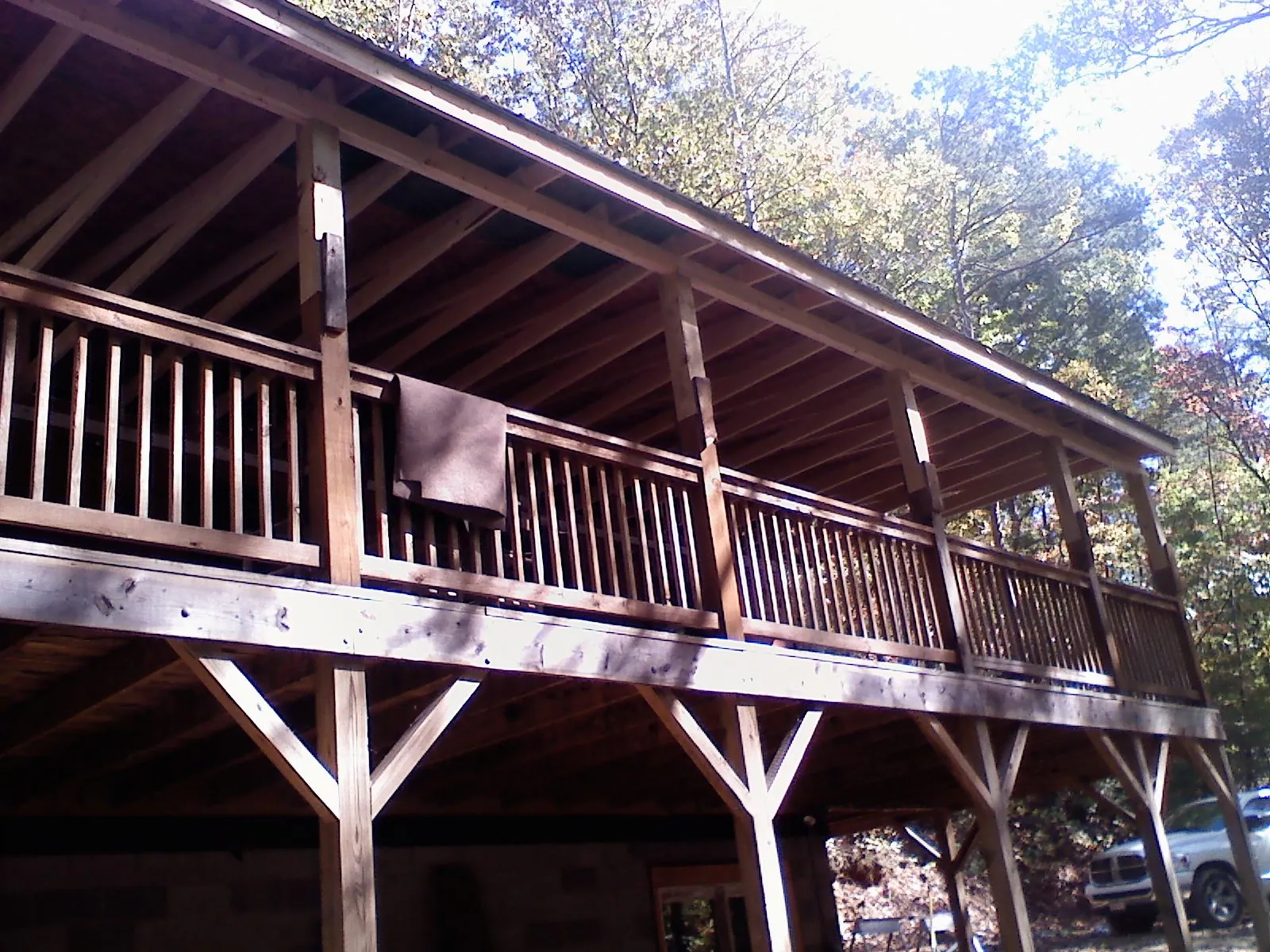Timber framing under a new elevated porch and deck — Roof Leak Repair in Cold Spring by Roofing Brothers